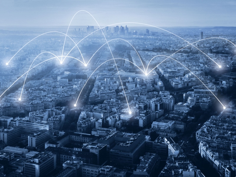 Connected city infrastructure with digital network connectivity and data transfer.