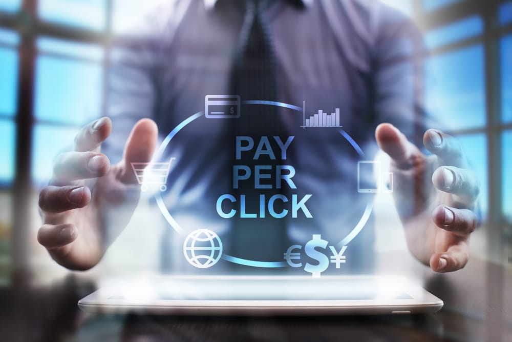 Pay per click digital marketing advertising platform on tablet screen.