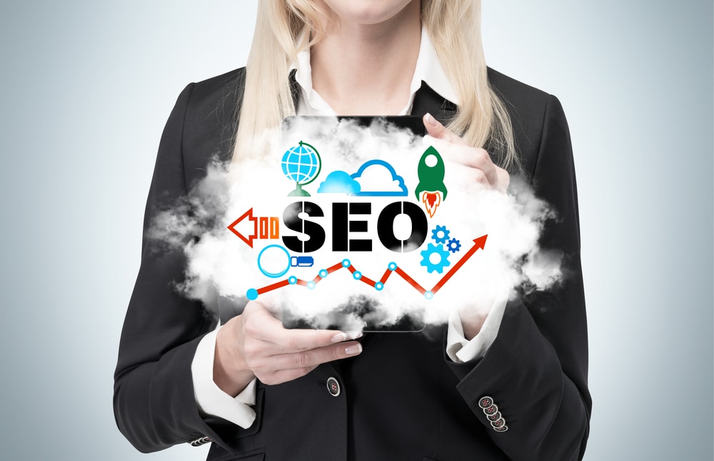 SEO optimization concepts with digital marketing icons and upward growth chart.
