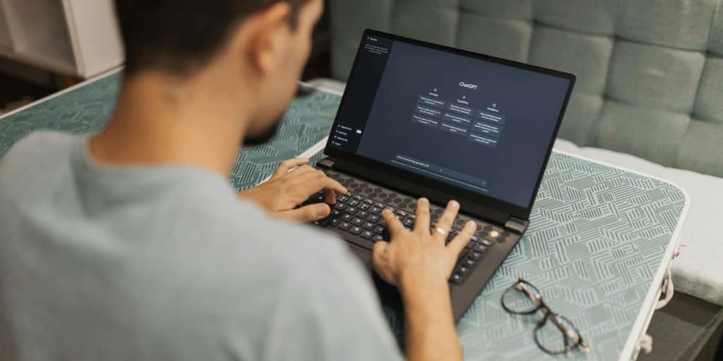 AI-powered chatbot interface on a laptop for business automation and customer engagement.