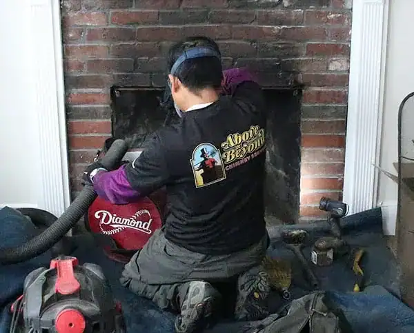 Efficient fireplace chimney cleaning by professional technicians.