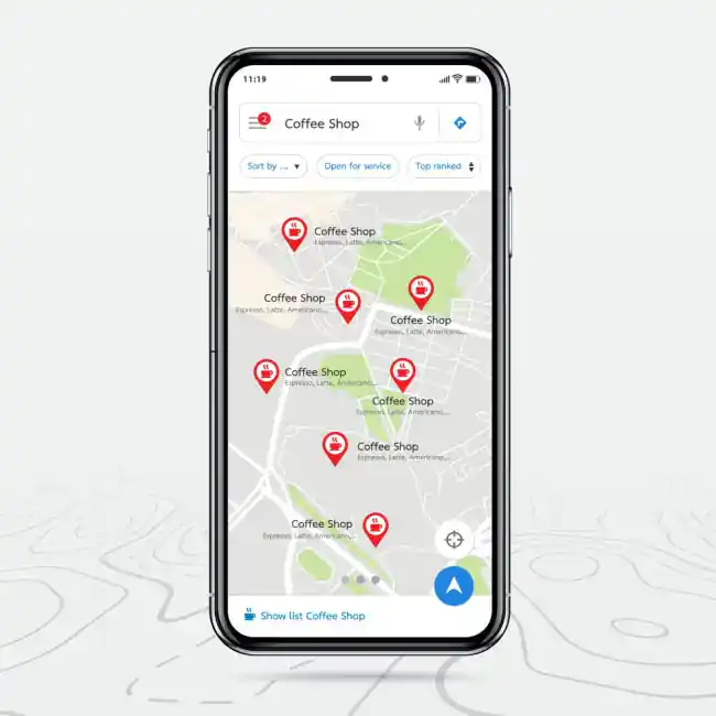 A smartphone screen displays a map with multiple red location pins labeled "Coffee Shop," indicating various coffee shop locations in the area. The map is part of a navigation app.